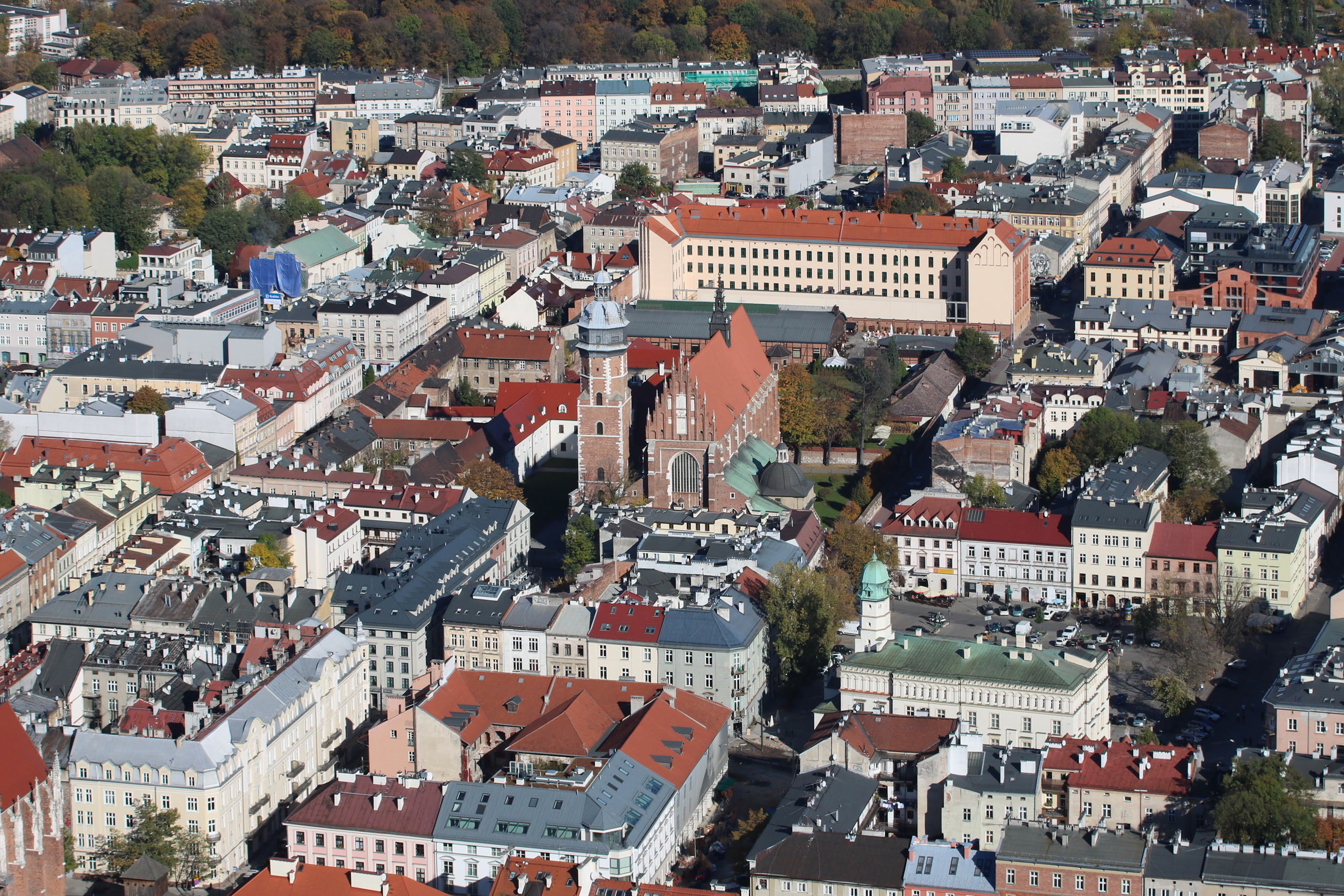 Kraków's Kazimierz rooftops and Corpus Christi Basilica from a balloon. Poland, Offshore BPO Confidence Index 2023