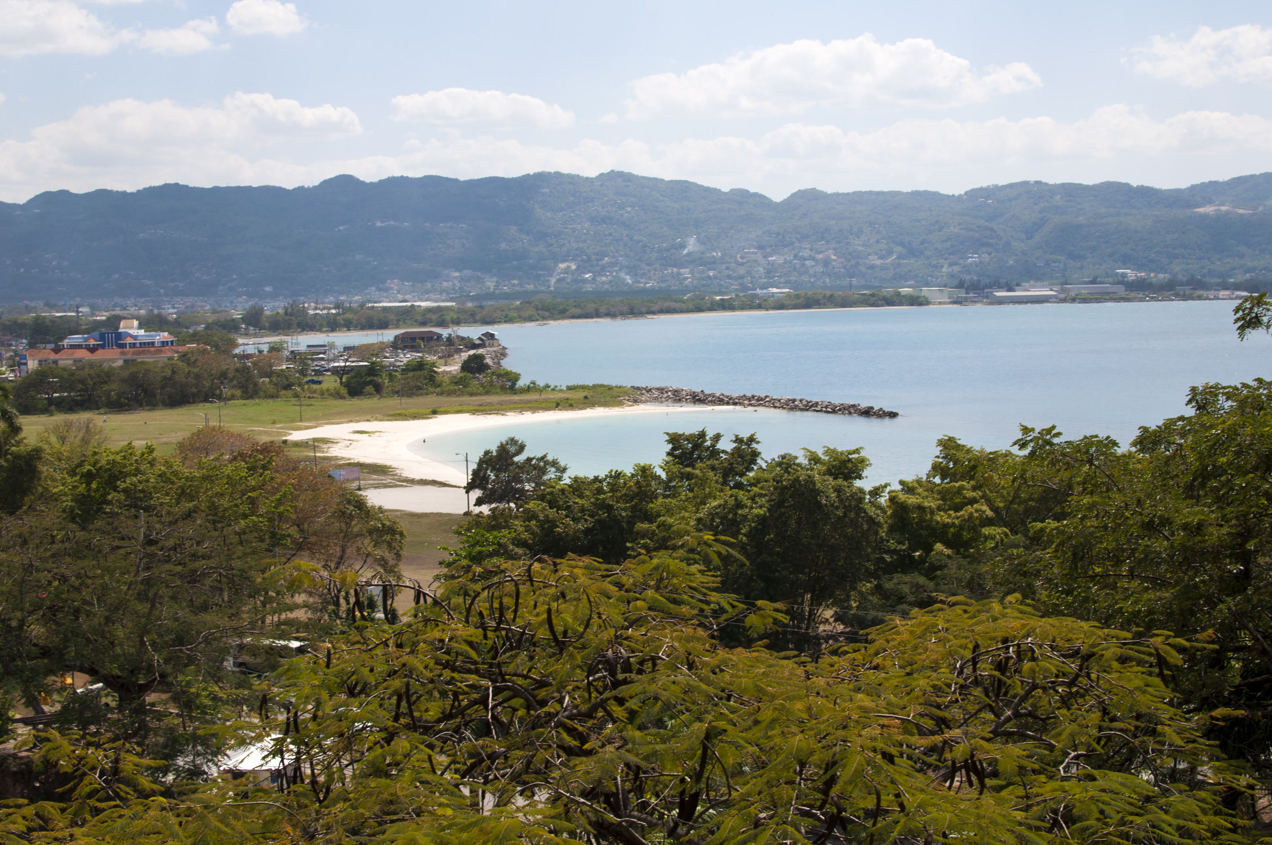 Montego Bay waterfront and hills; Commons has no usable Kingston cityscape. Jamaica, Offshore BPO Confidence Index 2023