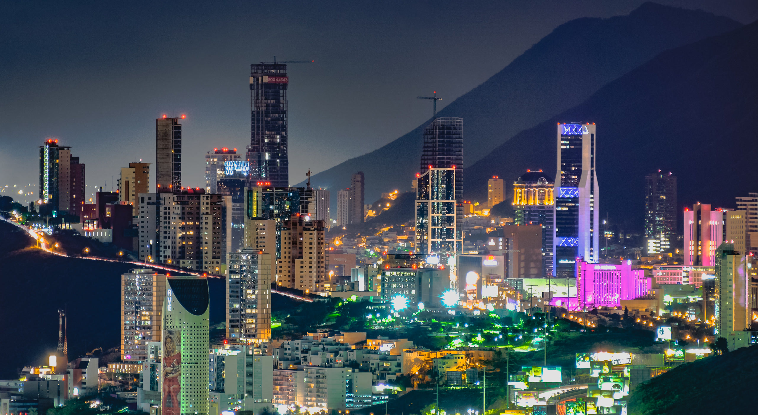 Valle Oriente skyscrapers in metropolitan Monterrey at night under the Sierra Madre. Mexico, Offshore BPO Confidence Index 2023